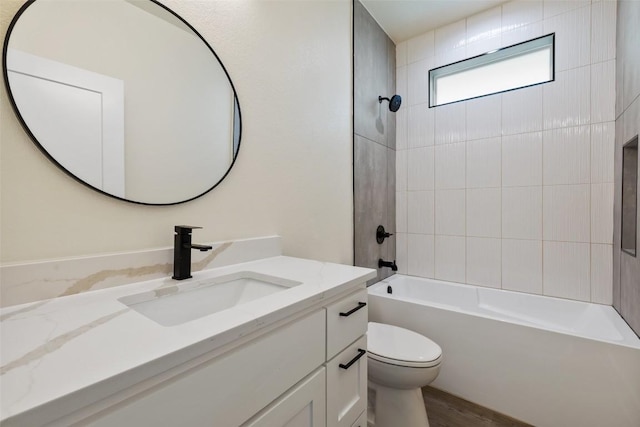 1000 Vargas Rd Unit A, Austin, TX 78741 - bathroom featuring vanity, bathtub / shower combination, and wood finished floors