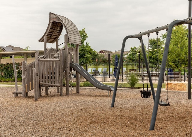 community play area featuring fence