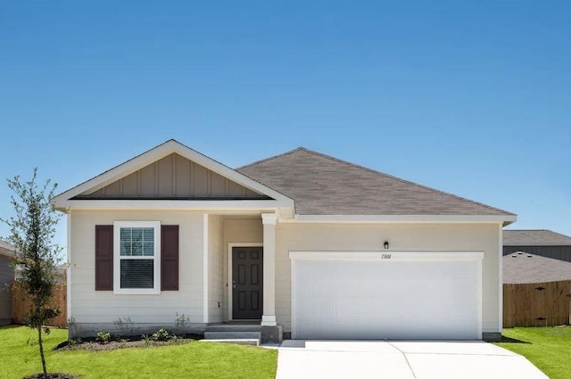 single story home with a garage, fence, a shingled roof, board and batten siding, and driveway