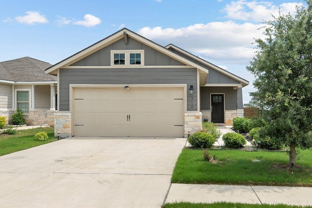 316 Ancellotta Way, Leander, TX 78641 - craftsman inspired home with stone siding, board and batten siding, and a garage