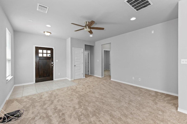 316 Ancellotta Way, Leander, TX 78641 - foyer entrance with carpet, a ceiling fan, recessed lighting, baseboards, and tile patterned flooring