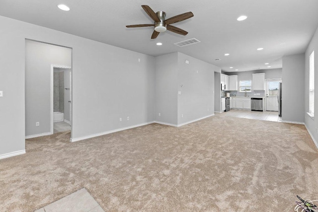 316 Ancellotta Way, Leander, TX 78641 - unfurnished living room featuring light carpet, recessed lighting, ceiling fan, and baseboards