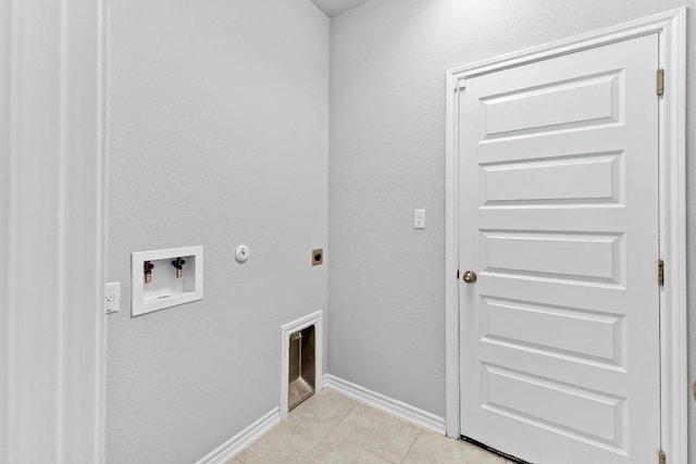 316 Ancellotta Way, Leander, TX 78641 - laundry room featuring electric dryer hookup, hookup for a washing machine, hookup for a gas dryer, baseboards, and light tile patterned floors