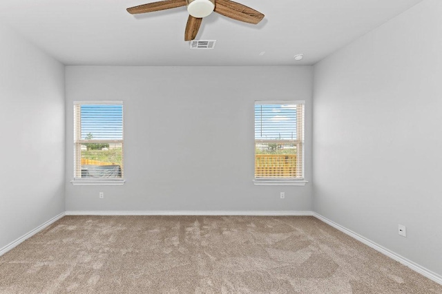 316 Ancellotta Way, Leander, TX 78641 - unfurnished room with carpet, healthy amount of natural light, a ceiling fan, and baseboards
