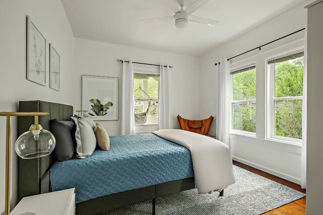 1613 Garden St, Austin, TX 78702 - bedroom with wood finished floors and ceiling fan