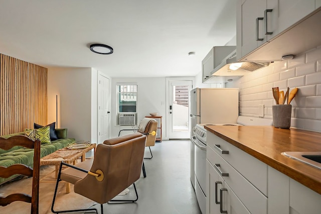 interior space featuring finished concrete flooring