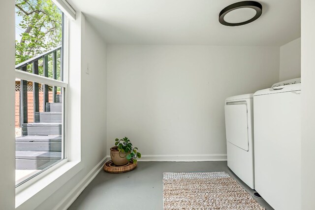 1613 Garden St, Austin, TX 78702 - laundry room with independent washer and dryer and baseboards