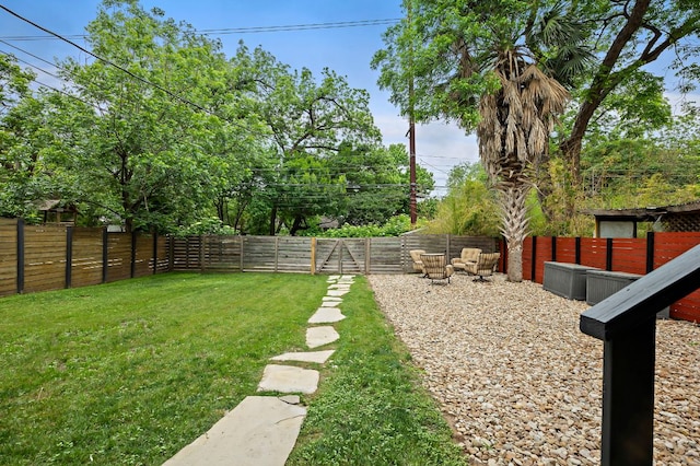 view of yard featuring a fenced backyard