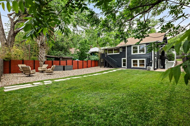 1613 Garden St, Austin, TX 78702 - fenced backyard with stairs