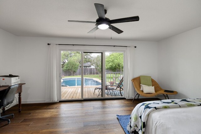 bedroom with wood-type flooring, baseboards, ceiling fan, and access to exterior