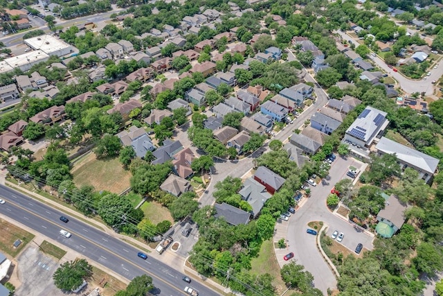 birds eye view of property with a residential view