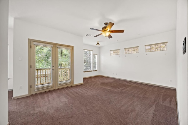 6704 Menchaca Rd Unit 43, Austin, TX 78745 - empty room featuring carpet, a ceiling fan, french doors, and baseboards