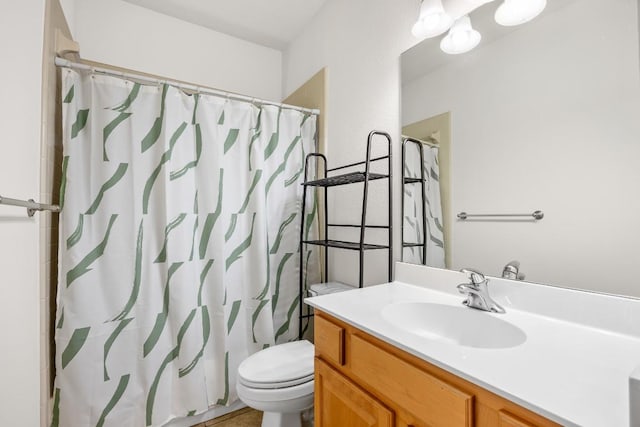 6704 Menchaca Rd Unit 43, Austin, TX 78745 - full bathroom featuring vanity, toilet, and curtained shower