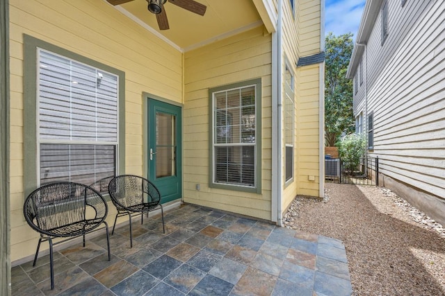 exterior space with ceiling fan
