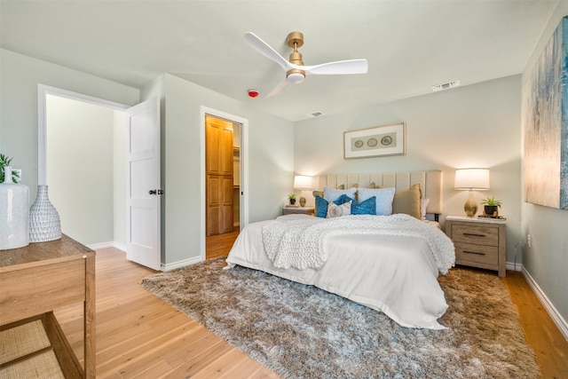1007 Payne Ave, Austin, TX 78757 - bedroom featuring visible vents, a ceiling fan, baseboards, and light wood-type flooring