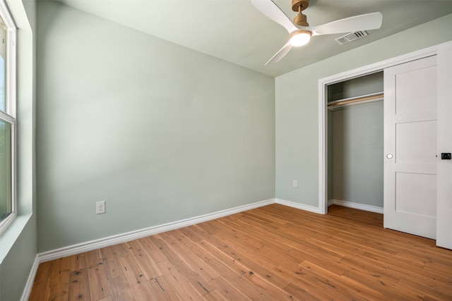 1007 Payne Ave, Austin, TX 78757 - unfurnished bedroom with visible vents, a closet, wood-type flooring, baseboards, and ceiling fan