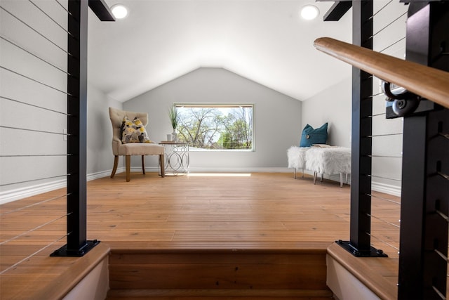 1007 Payne Ave, Austin, TX 78757 - unfurnished bedroom featuring baseboards, lofted ceiling, and hardwood / wood-style flooring