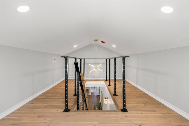 1007 Payne Ave, Austin, TX 78757 - bonus room featuring baseboards, recessed lighting, wood finished floors, and vaulted ceiling