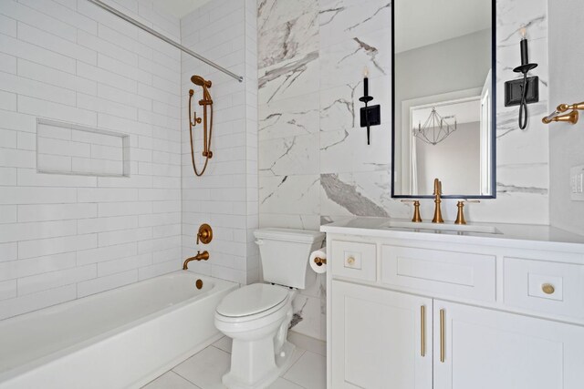 full bath with vanity, tile patterned flooring, toilet, tile walls, and  shower combination