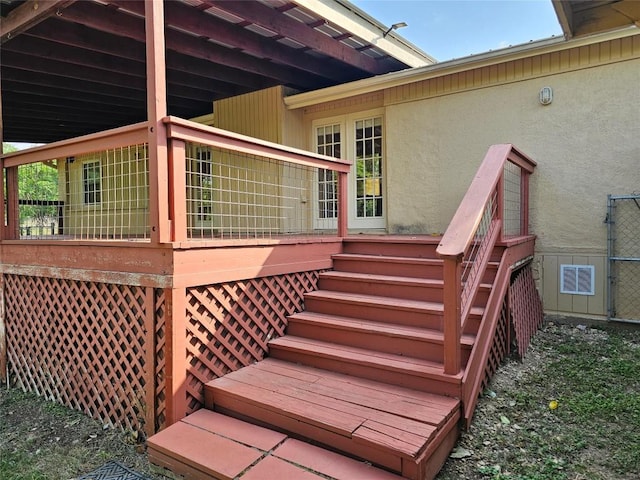 deck featuring stairway