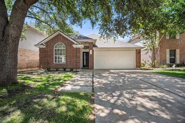ranch-style home featuring an attached garage, driveway, and brick siding