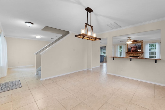 1809 Woodland Dr, Cedar Park, TX 78613 - unfurnished living room featuring crown molding, stairs, ceiling fan, and light tile patterned flooring