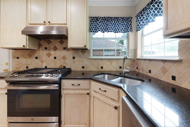 1809 Woodland Dr, Cedar Park, TX 78613 - kitchen with stainless steel gas stove, light brown cabinets, tasteful backsplash, a sink, and exhaust hood