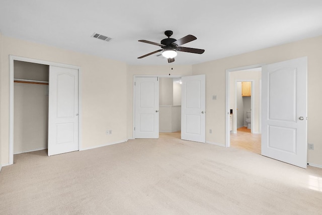 1809 Woodland Dr, Cedar Park, TX 78613 - unfurnished bedroom featuring baseboards, visible vents, a ceiling fan, and light colored carpet