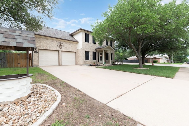 1809 Woodland Dr, Cedar Park, TX 78613 - view of front of property with brick siding, fence, a front lawn, concrete driveway, and an attached garage