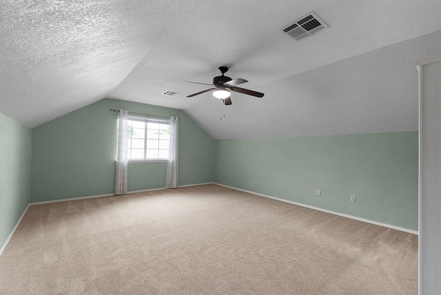 1809 Woodland Dr, Cedar Park, TX 78613 - bonus room with visible vents, carpet, baseboards, and vaulted ceiling