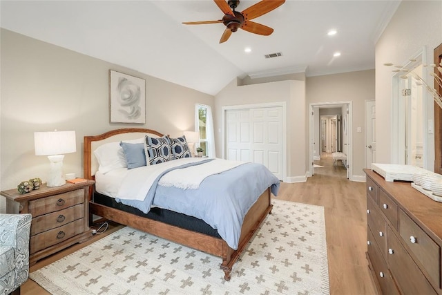 bedroom featuring a closet, crown molding, visible vents, recessed lighting, and light wood-style flooring