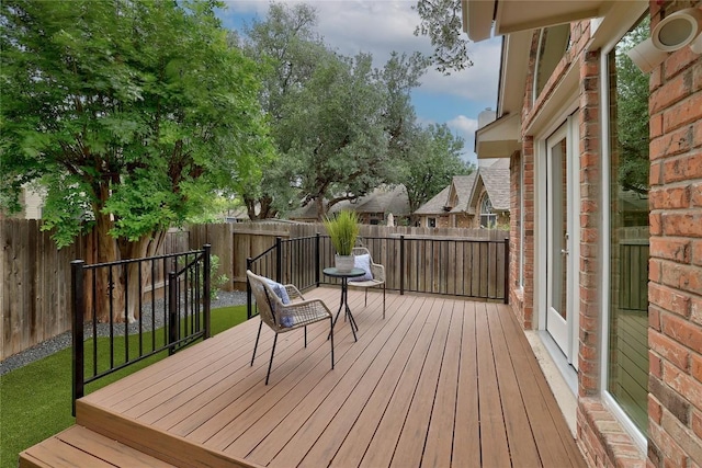 deck featuring a fenced backyard