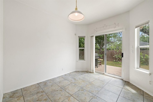 407 N Lori Cir, Bastrop, TX 78602 - spare room featuring light tile patterned floors and baseboards