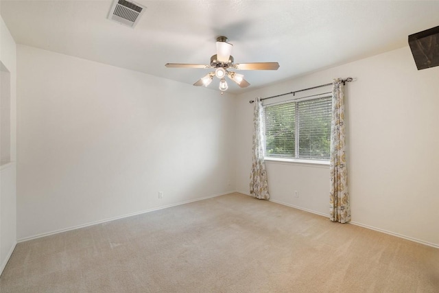407 N Lori Cir, Bastrop, TX 78602 - empty room with carpet floors, a ceiling fan, and baseboards