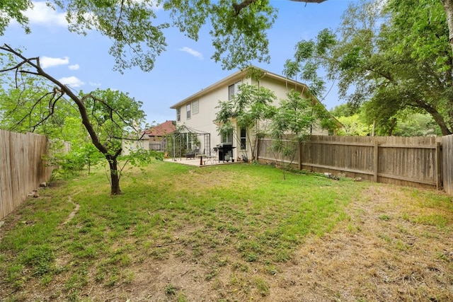 view of yard with a gazebo, a fenced backyard, and a patio area