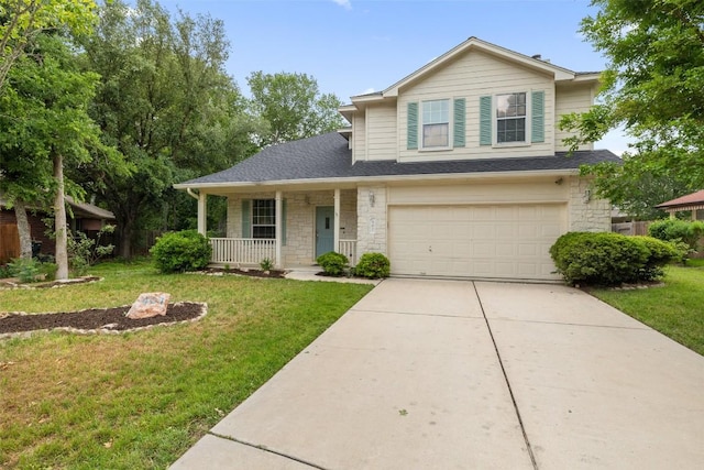 traditional-style house featuring a garage, a front lawn, covered porch, stone siding, and concrete driveway