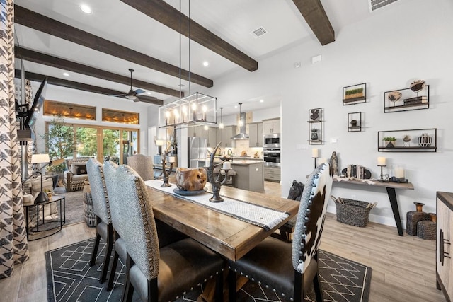 741 Faith Dr, Liberty Hill, TX 78642 - dining area featuring ceiling fan, light wood-style floors, beam ceiling, baseboards, and recessed lighting