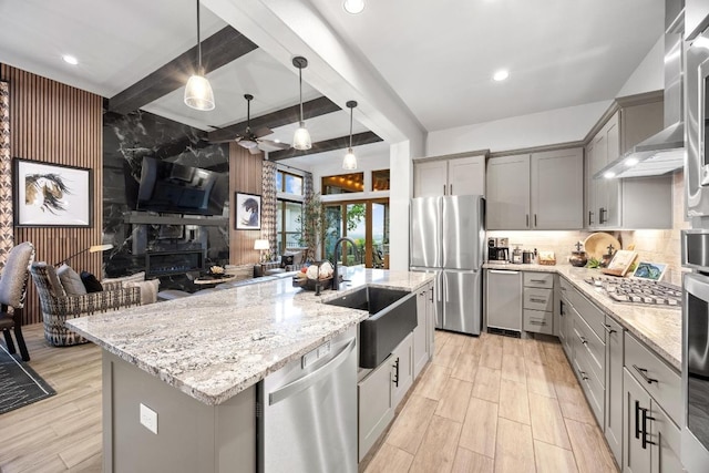 741 Faith Dr, Liberty Hill, TX 78642 - kitchen with gray cabinets, stainless steel appliances, a sink, ceiling fan, and beamed ceiling