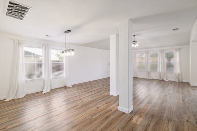 3339 Alexander Valley Cv, Round Rock, TX 78665 - unfurnished living room with plenty of natural light, ceiling fan, and wood finished floors
