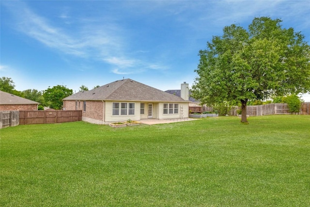 3339 Alexander Valley Cv, Round Rock, TX 78665 - rear view of house featuring a chimney, a patio area, and a fenced backyard