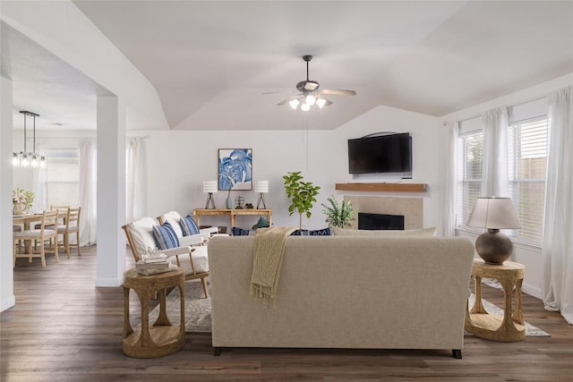 3339 Alexander Valley Cv, Round Rock, TX 78665 - living room with ceiling fan, dark wood-style floors, lofted ceiling, and a tiled fireplace