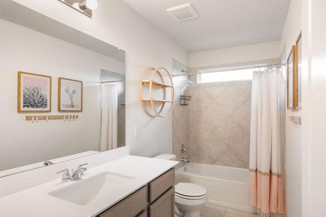 bathroom featuring visible vents, tile patterned flooring, vanity, toilet, and shower / bath combo with shower curtain