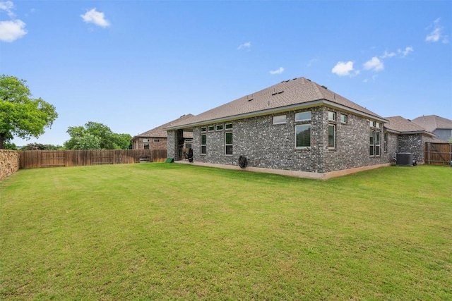 2217 Belen Dr, Leander, TX 78641 - back of house featuring brick siding