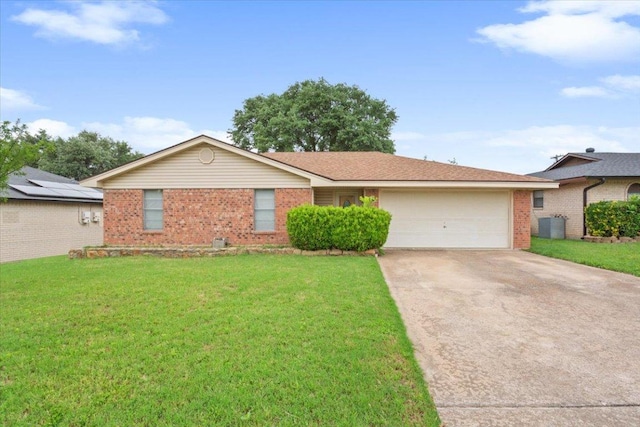 ranch-style house with brick siding, a front yard, and concrete driveway