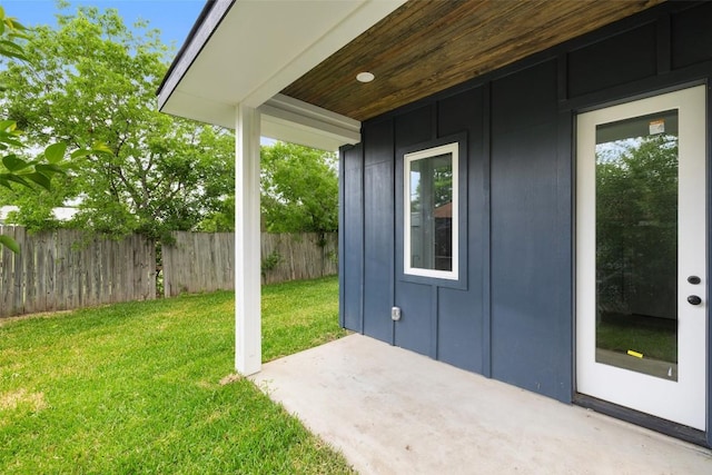 1000B Vargas Rd Unit B, Austin, TX 78741 - exterior space with a lawn, fence, board and batten siding, and a patio area