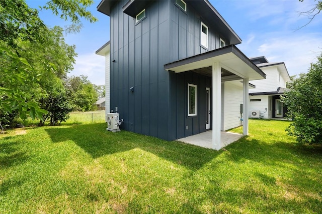1000B Vargas Rd Unit B, Austin, TX 78741 - rear view of property featuring a yard, a patio, board and batten siding, and ac unit
