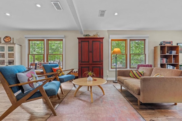 sitting room featuring visible vents, recessed lighting, light wood finished floors, and plenty of natural light