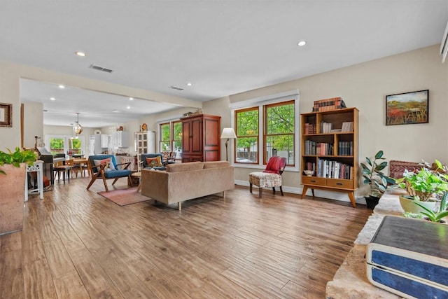5414 Duval St, Austin, TX 78751 - living area featuring light wood-style floors and recessed lighting