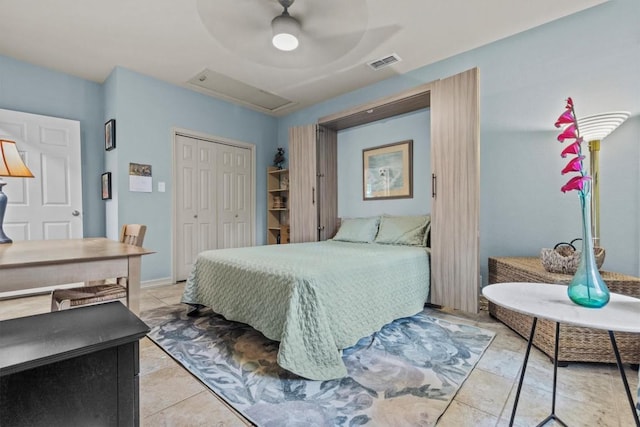 5414 Duval St, Austin, TX 78751 - bedroom featuring a closet, light tile patterned floors, and a ceiling fan