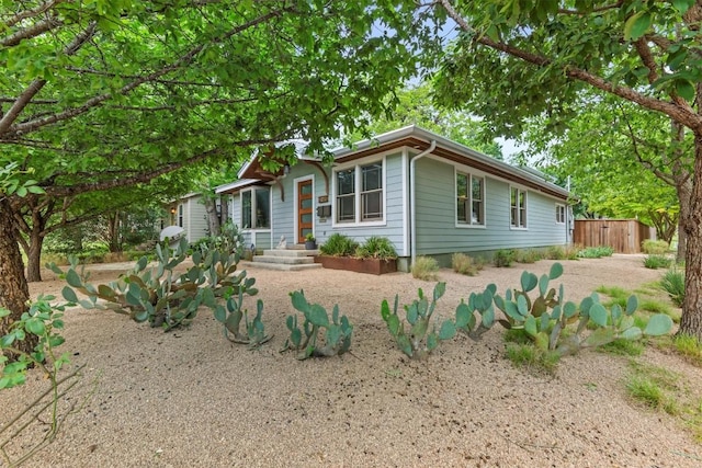 view of front of property with fence